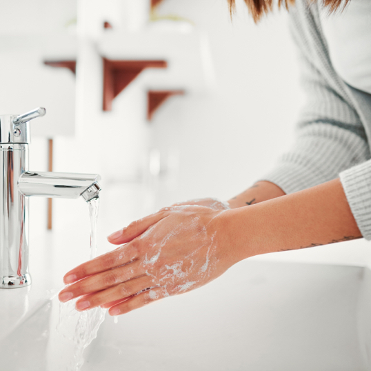 Woman washing hands